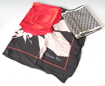 Lot 440 - A Christian Dior silk scarf, decorated with...