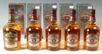 Lot 267 - Four boxed bottles of Chivas Regal 12 Years...
