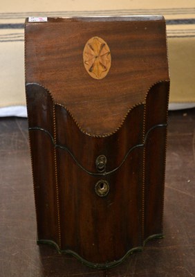 Lot 407 - A 19th century mahogany serpentine front knife...