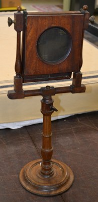 Lot 389 - A 18th/19th century Zograscope, the lens and...