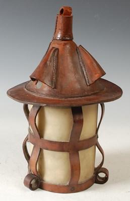 Lot 392 - An Arts & Crafts leather and vellum lantern,...