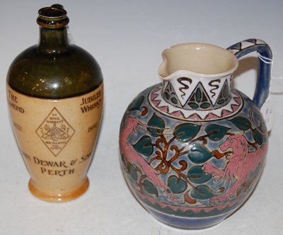 Lot 209 - A Royal Doulton Arts and Crafts style jug,...