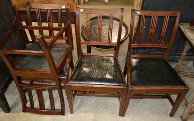 Lot 708 - A set of four Georgian mahogany dining chairs,...