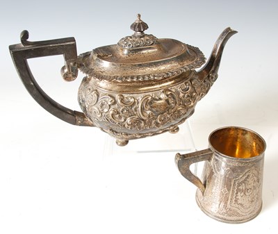 Lot 119 - A Chester silver teapot, embossed with floral...