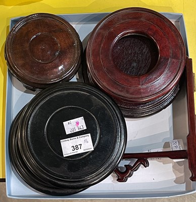 Lot 387 - A box of assorted hardwood vase stands in the...