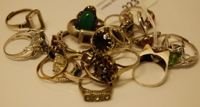 Lot 223 - A quantity of silver and white metal rings set...