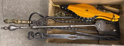 Lot 525 - A box of assorted fire tools, to include a...