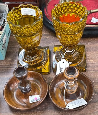 Lot 282 - A pair of amber glass goblets, raised on a...