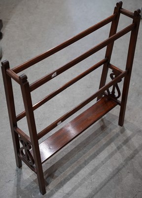 Lot 681 - An Edwardian mahogany towel rail in the Art...