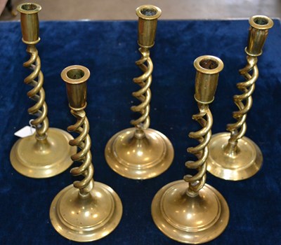 Lot 425 - A group of five 20th century brass barley...