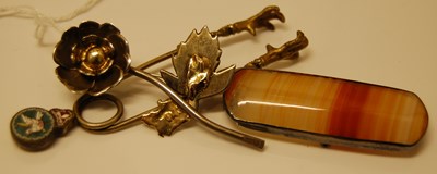 Lot 225 - A white and yellow metal flower brooch, a...