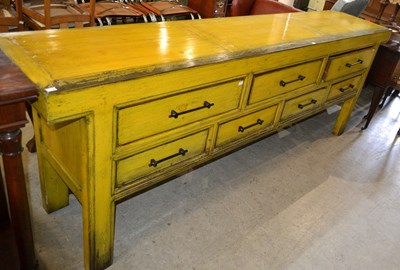 Lot 699 - A large yellow rustic wooden sideboard,...