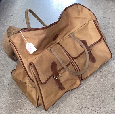 Lot 528 - A Ralph Lauren canvas and leather trim travel...