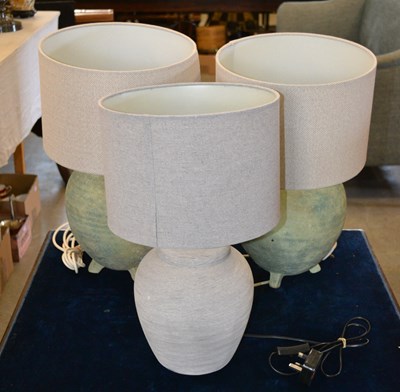 Lot 430 - A pair of green stone table lamps, with...