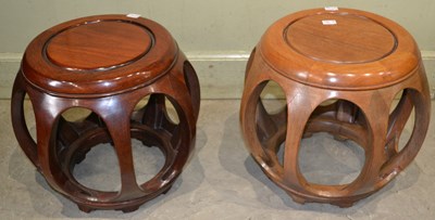 Lot 622 - A pair of Chinese style darkwood barrel shaped...