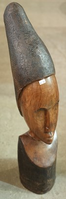 Lot 747 - A large hand carved wooden African tribal bust,...