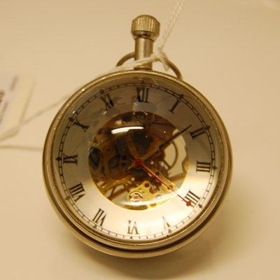 Lot 228 - A chrome mounted glass ball clock with black...