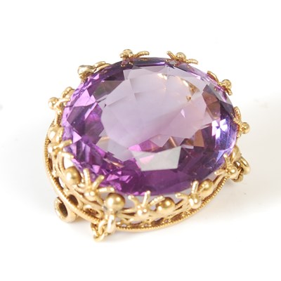 Lot 23 - A late 19th century amethyst and gold oval...