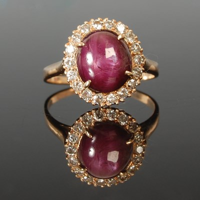 Lot 66 - A yellow metal diamond and star ruby cluster...