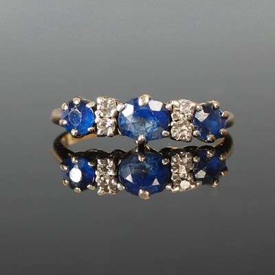 Lot 65 - A yellow and white metal, sapphire and diamond...