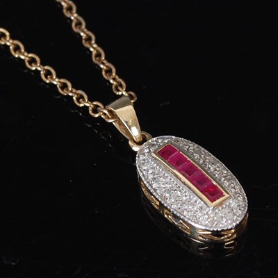 Lot 1 - A 9ct gold-mounted ruby & diamond pendant and...