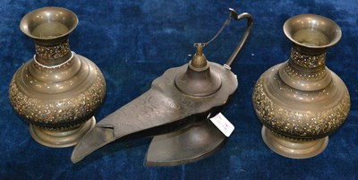Lot 435 - A pair of 20th century middle eastern brass...