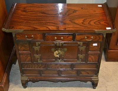 Lot 764 - A Korean brass mounted hardwood side cabinet,...