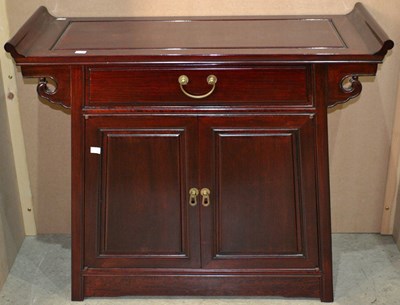 Lot 748 - A Chinese darkwood side cabinet, with...