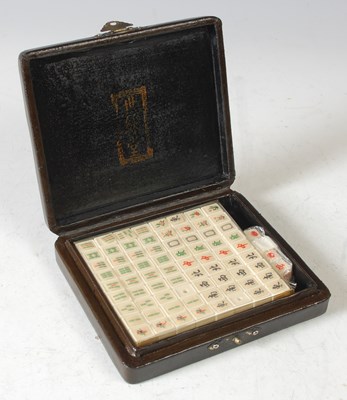 Lot 281 - A 20th century cased Mahjong set, 15cm wide.