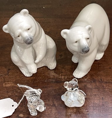Lot 220 - Two Lladro polar bear figures with boxes,...