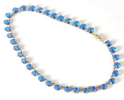 Lot 2 - A gilt metal and blue glass gem set necklace,...