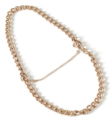 Lot 7 - A 9ct gold curb link chain, each link stamped '...