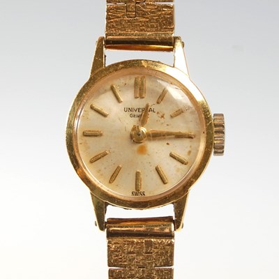 Lot 14 - A ladies 18ct gold Universal bracelet watch,...