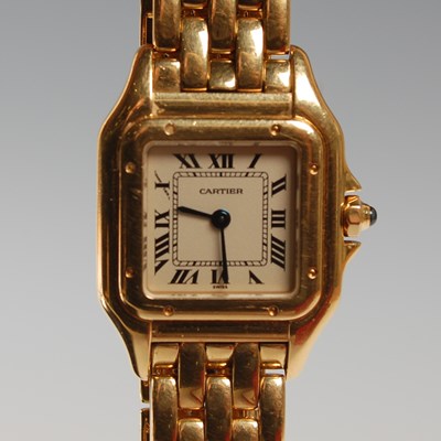 Lot 17 - Cartier, a ladies 18ct gold Panthere bracelet...