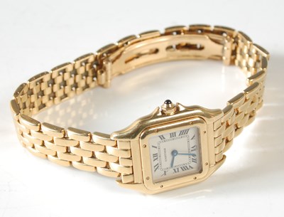 Lot 17 - Cartier, a ladies 18ct gold Panthere bracelet...