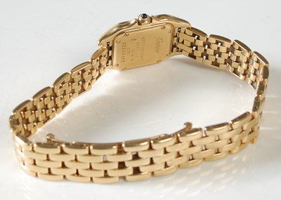 Lot 17 - Cartier, a ladies 18ct gold Panthere bracelet...