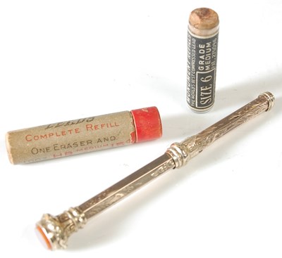 Lot 37 - A gold plated propelling pencil, the top with...