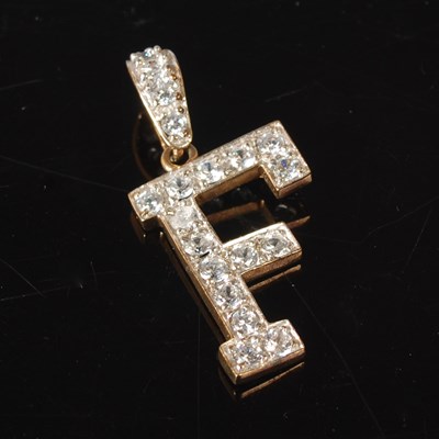 Lot 41 - A 9ct gold and gem set pendant in the form of...