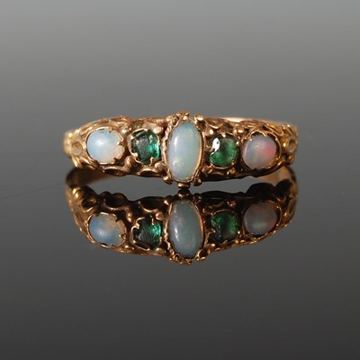 Lot 53 - A yellow metal opal and emerald five stone...