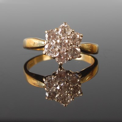 Lot 70 - An 18ct gold and diamond cluster 'daisy' ring,...