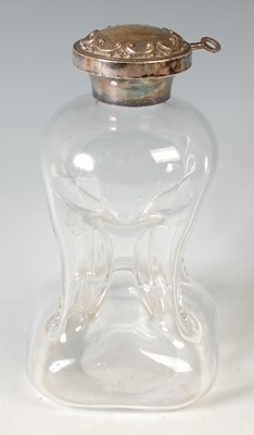 Lot 108 - An early 20th century clear glass spirits...