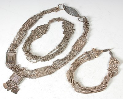 Lot 122 - A Middle Eastern white metal five strand...