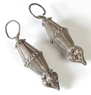 Lot 127 - A pair of Omani white metal silver earrings /...