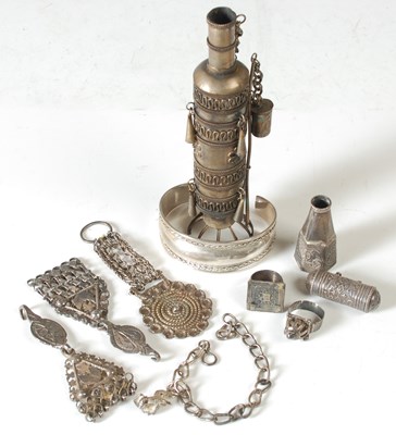 Lot 129 - A collection of assorted Persian white metal...