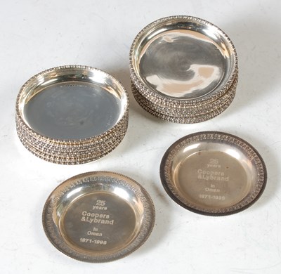 Lot 138 - A pair of Omani silver circular dishes,...