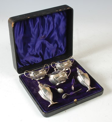 Lot 155 - A Birmingham silver five piece cruet set in...