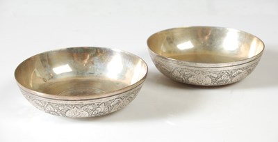 Lot 164 - A pair of silver plated coin set bowls, each...