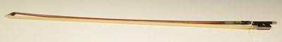 Lot 443 - Late 19th/ early 20th century violin bow...