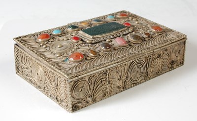 Lot 130 - An Eastern white metal box of rectangular form,...