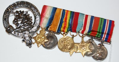 Lot 253 - Great War interest; a bar of seven miniature...